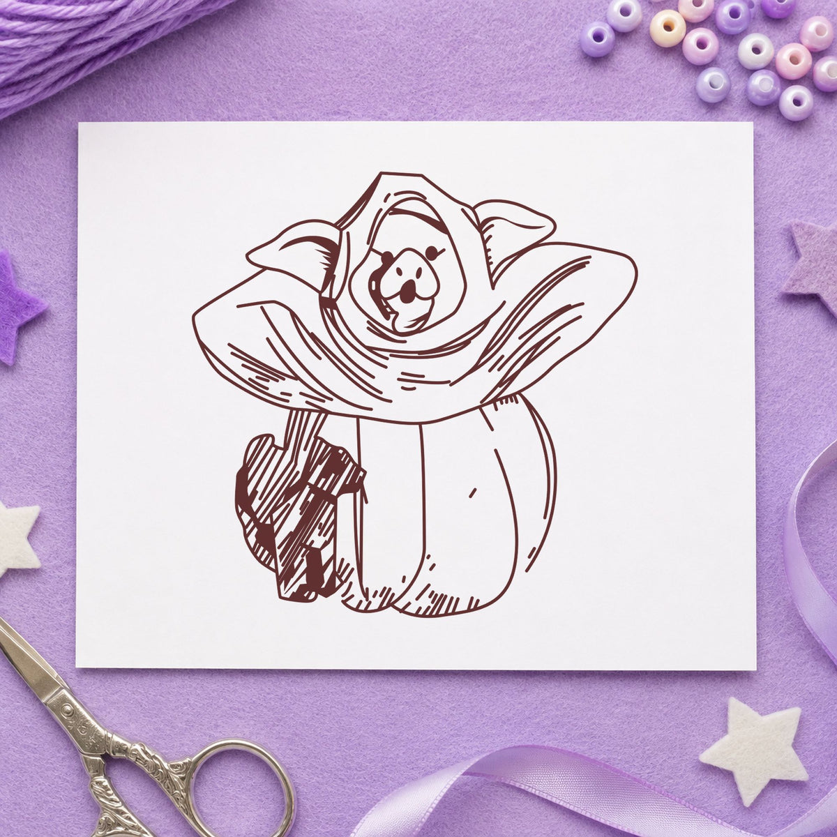 Pumpkin Costume Pig and Black Cat Rubber Stamp impression in brown ink on white paper in a styled craft setting.