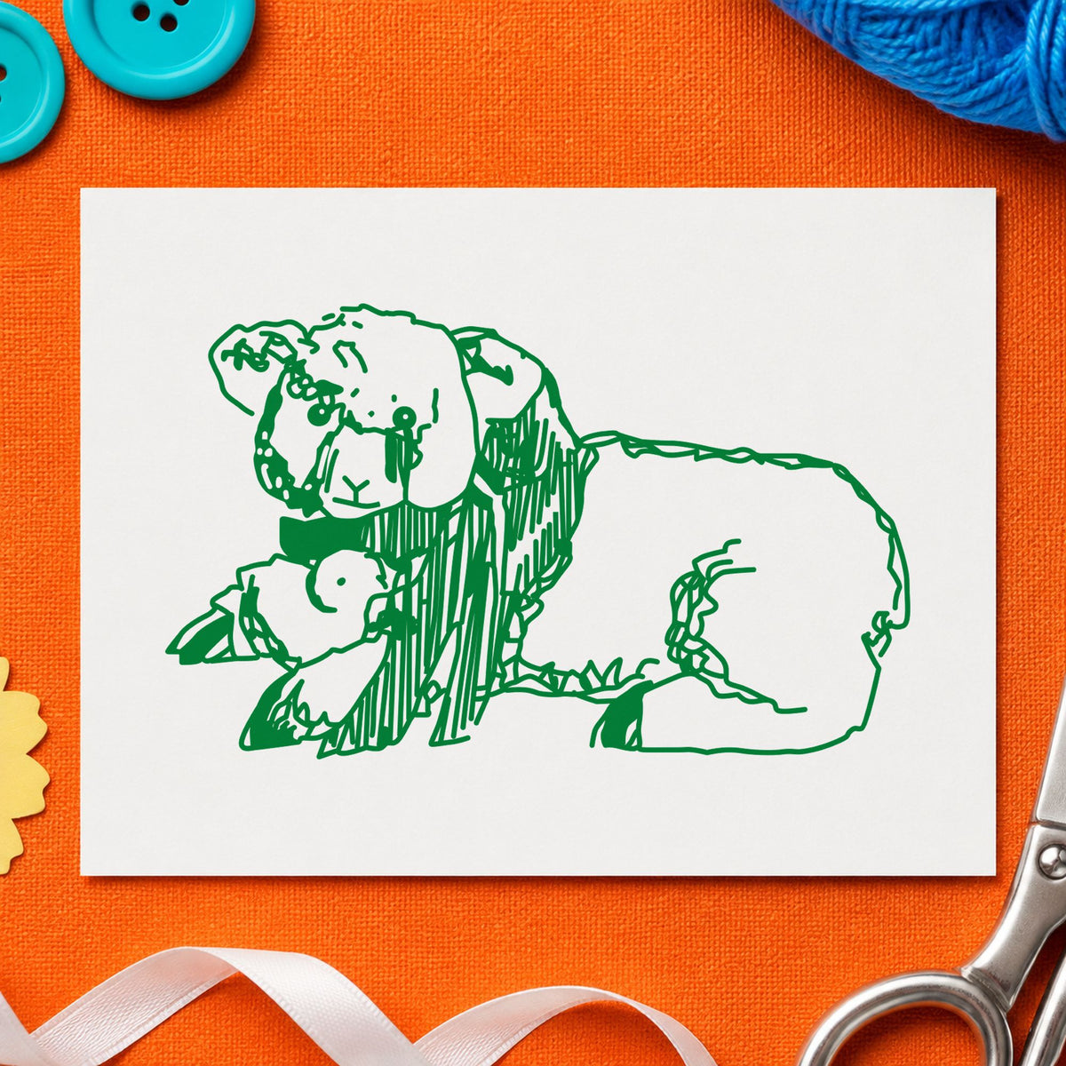 Lamb and Chicken Rubber Stamp impression in green ink on white paper in a styled craft setting.