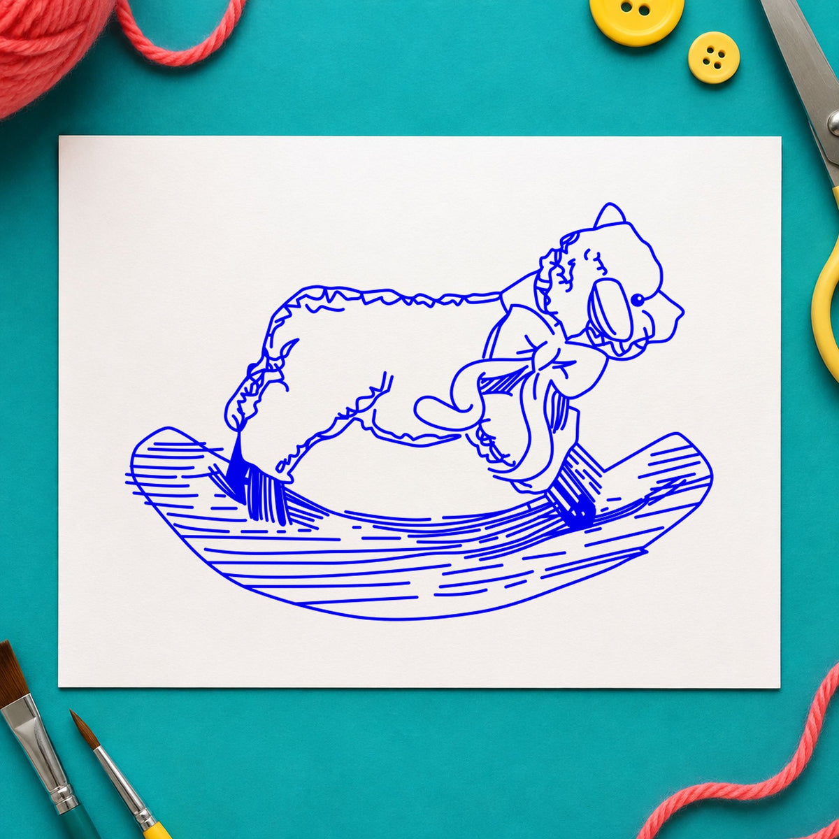 Blue farmhouse card making stamp impression featuring the rocking sheep design on white paper.