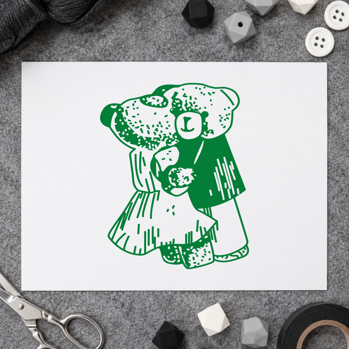 Dancing Teddy Bear Couple Rubber Stamp impression in green ink on white paper in a styled craft setting.