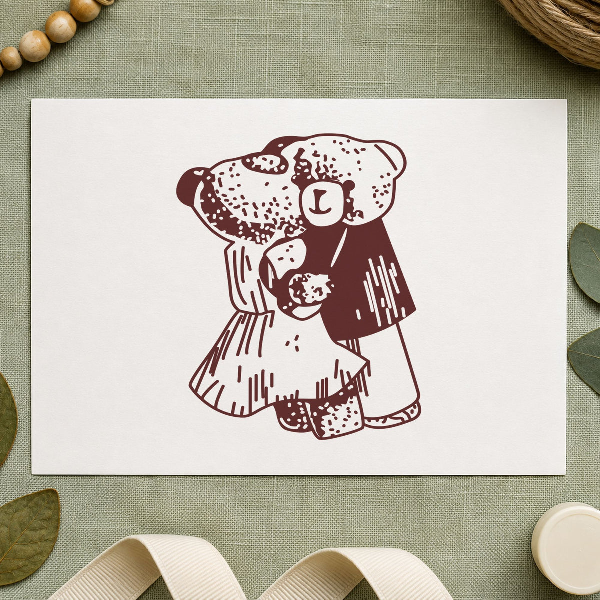 Dancing Teddy Bear Couple Rubber Stamp impression in brown ink on white paper in a styled craft setting.