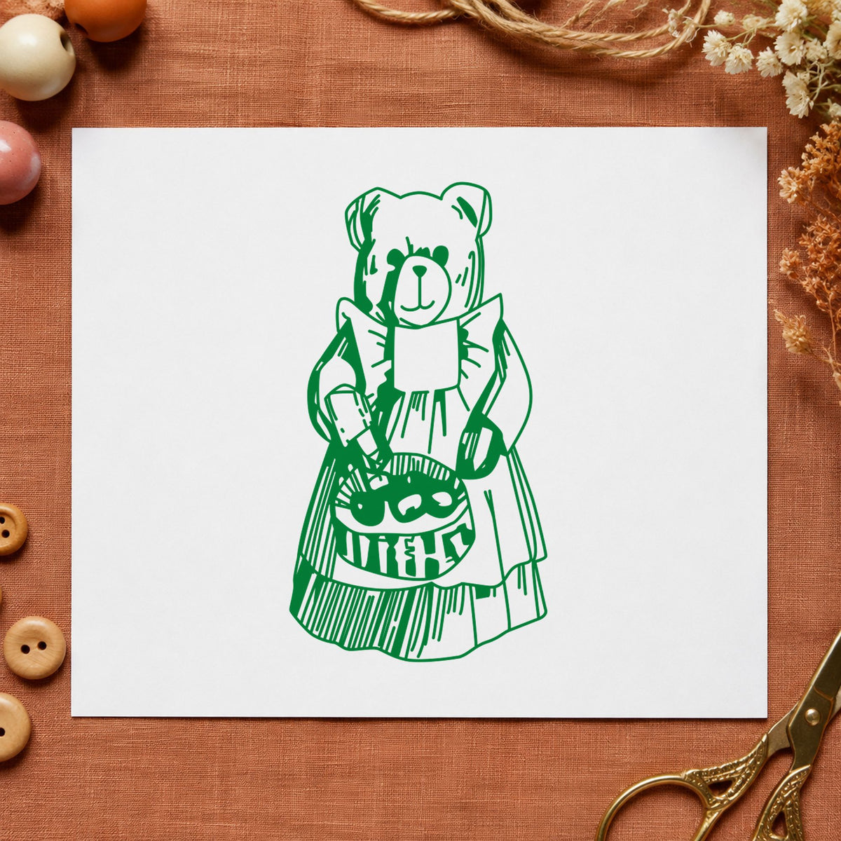 Country Bear with Produce Basket Rubber Stamp impression in green ink on white paper in a styled craft setting.