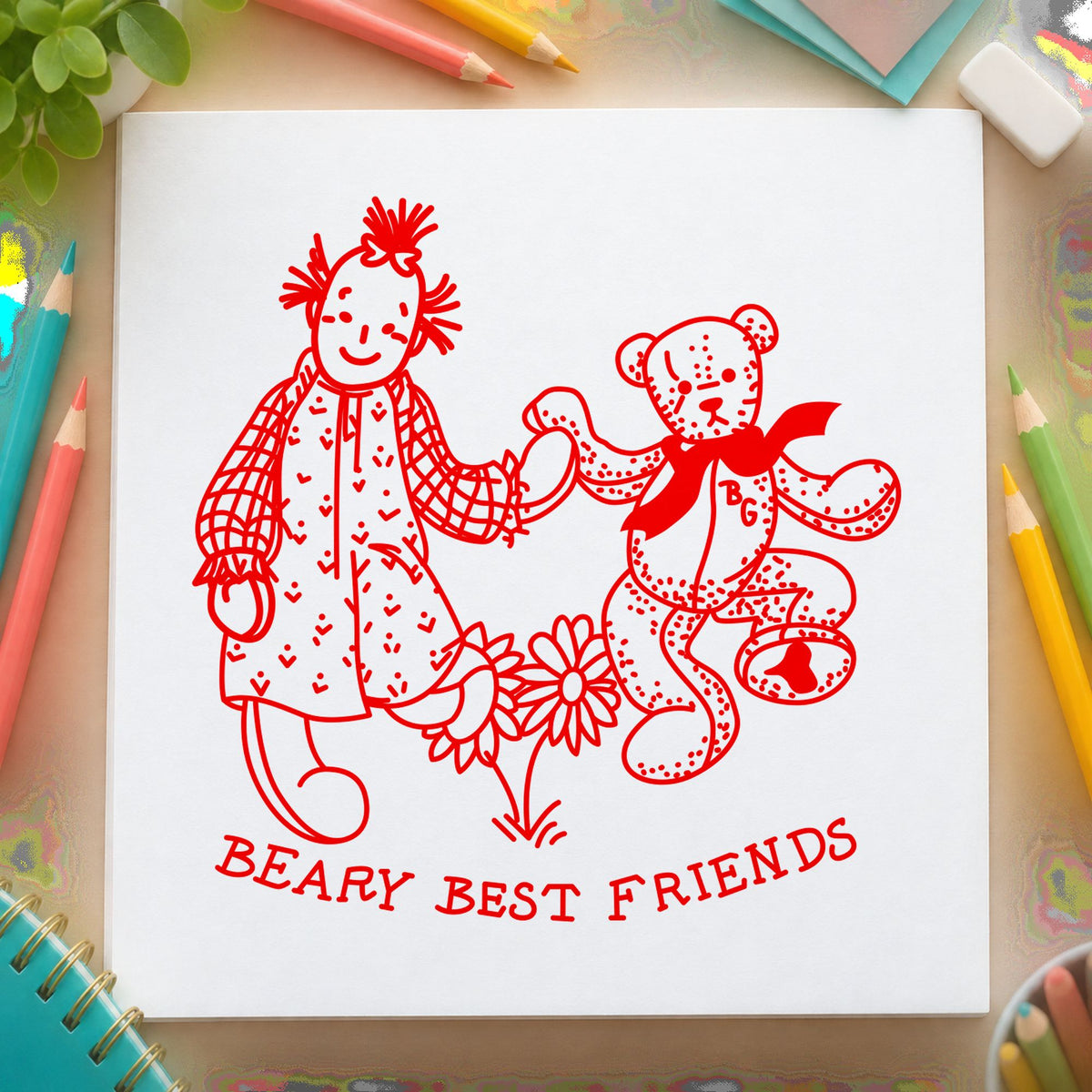 Beary Best Friends Bear and Doll Rubber Stamp impression in red ink on white paper in a styled craft setting.