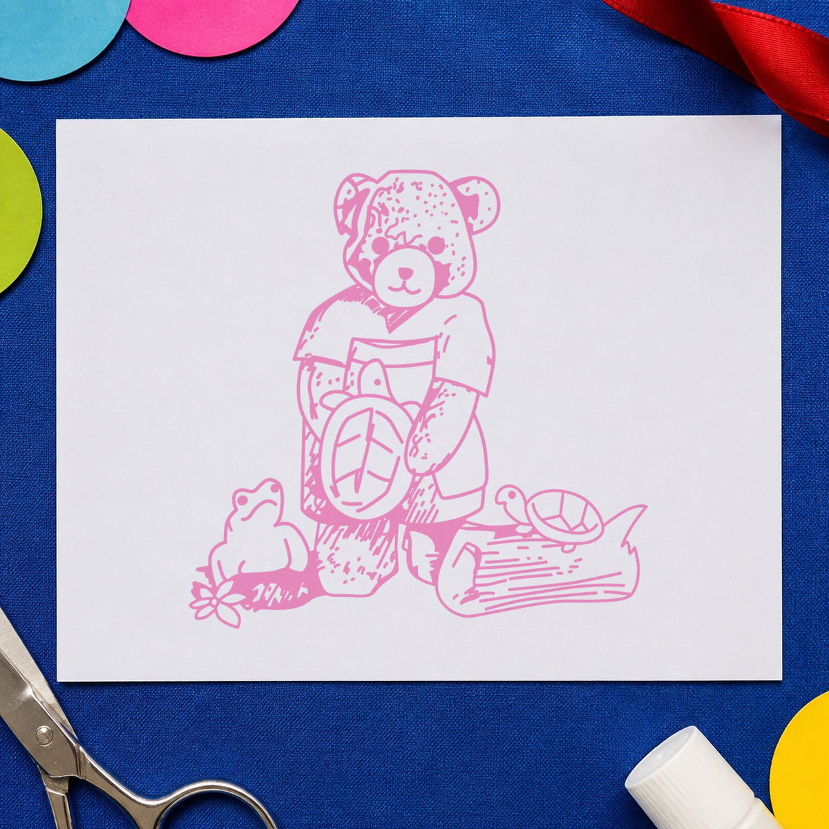 Bear with Turtles Rubber Stamp impression in pink ink on white paper in a styled craft setting.