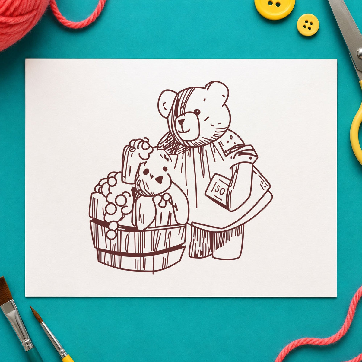 Bear Washing Teddy in Barrel Rubber Stamp impression in brown ink on white paper in a styled craft setting.