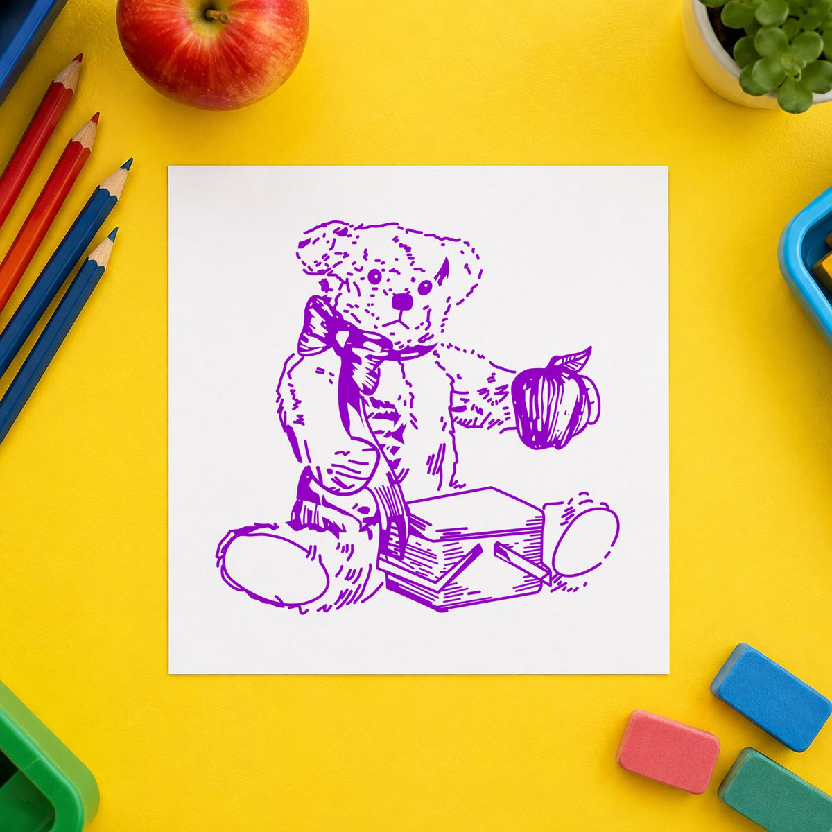 Bear with Picnic Basket and Apple Rubber Stamp impression in purple ink on white paper in a styled craft setting.
