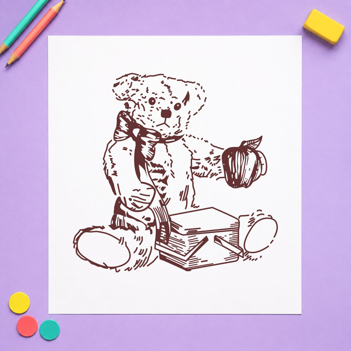 Bear with Picnic Basket and Apple Rubber Stamp impression in brown ink on white paper in a styled craft setting.