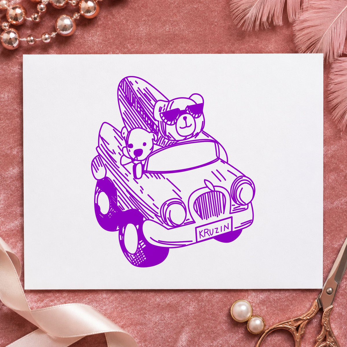 Surfboard Bear in Convertible Rubber Stamp impression in purple ink on white paper in a styled craft setting.