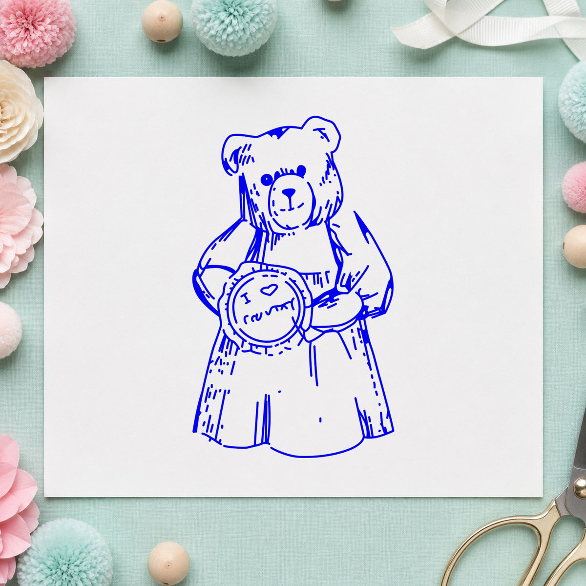 Blue baking rubber stamp impression featuring the i love country bear with pie design on white paper.