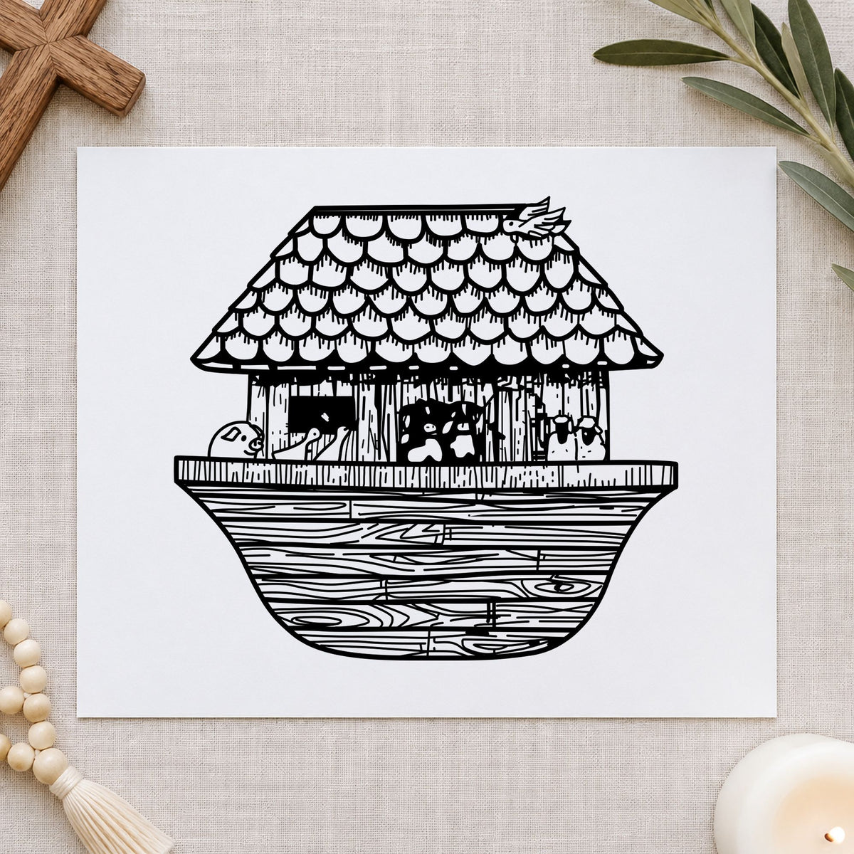 Black impression from a bible story rubber stamp, featuring the noah's ark wide design on white paper.