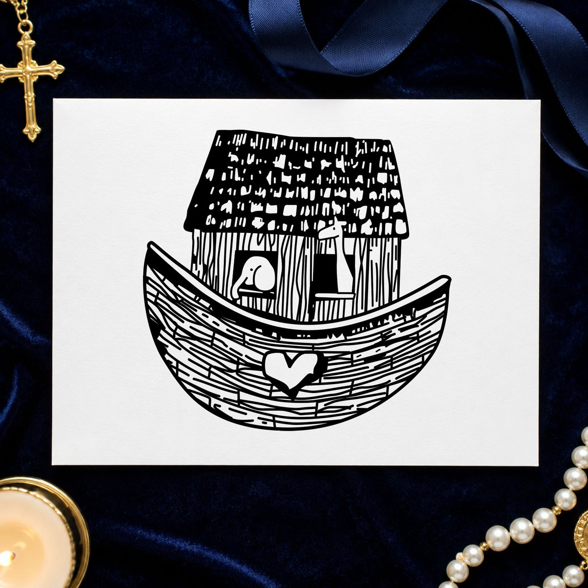 Black impression from a noah's ark stamp, featuring the square noah's ark design on white paper.