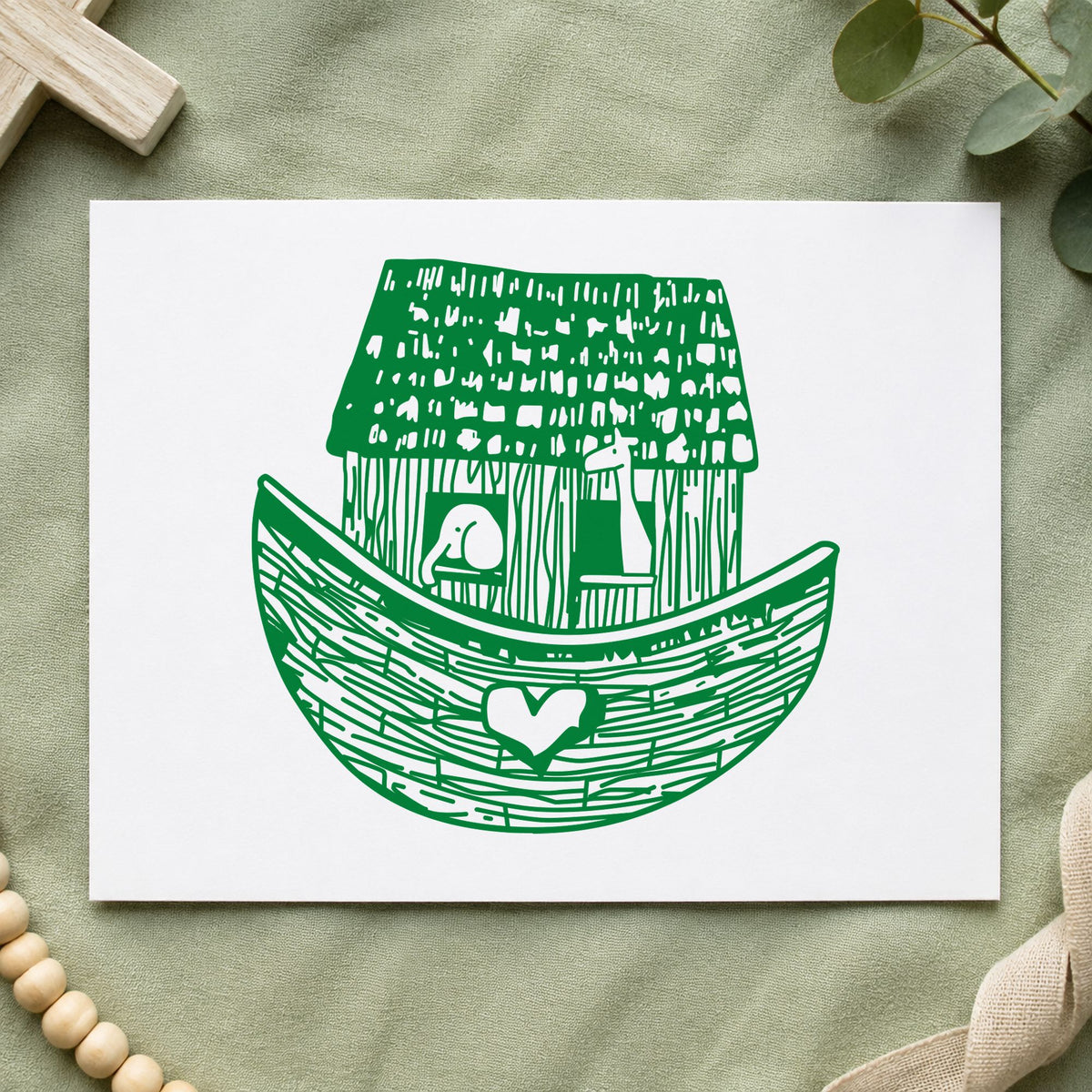 Square Noah's Ark Rubber Stamp impression in green ink on white paper in a styled craft setting.