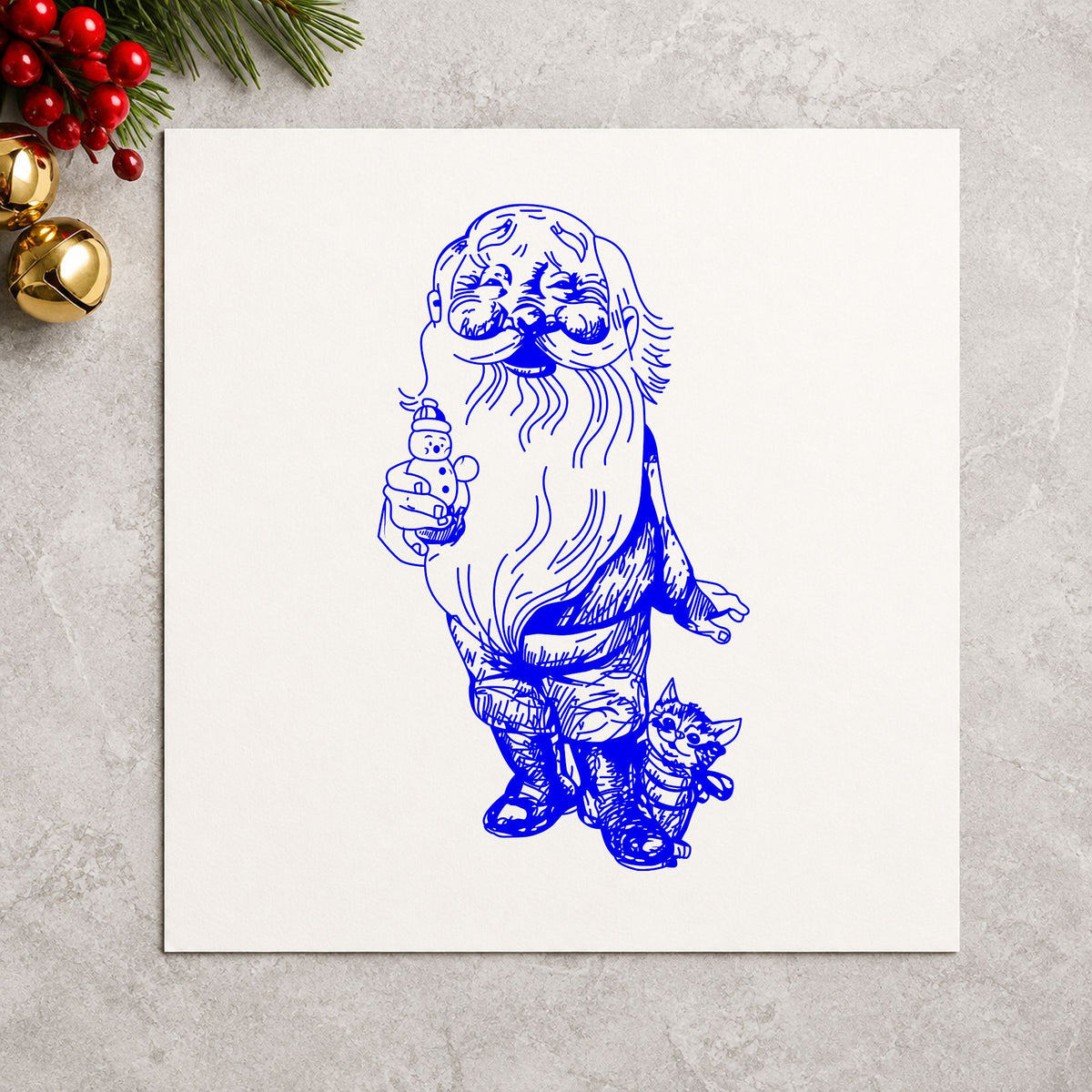 Blue winter holiday craft stamp impression featuring the santa with kitten and snowman design on white paper.