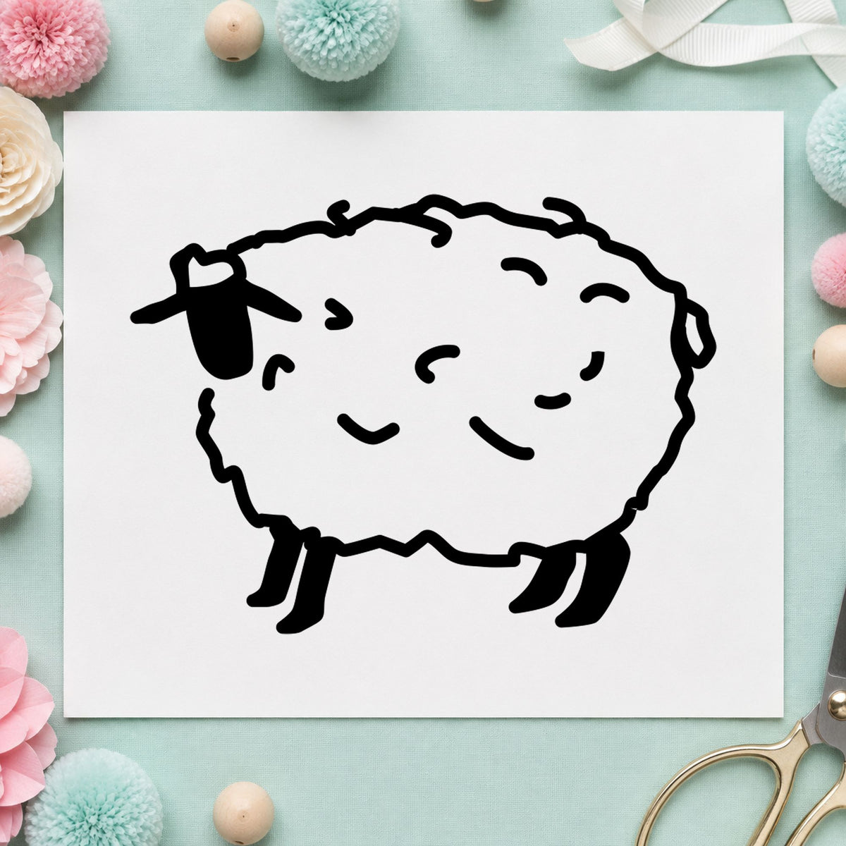 Black impression from a sheep craft stamp, featuring the folk art sheep design on white paper.