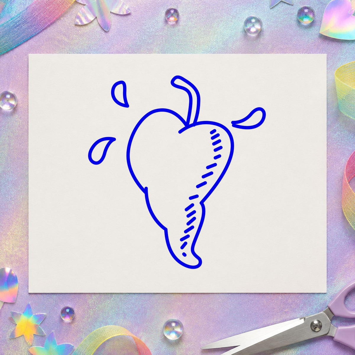 Heart-shaped Pepper Rubber Stamp impression in blue ink on white paper in a styled craft setting.