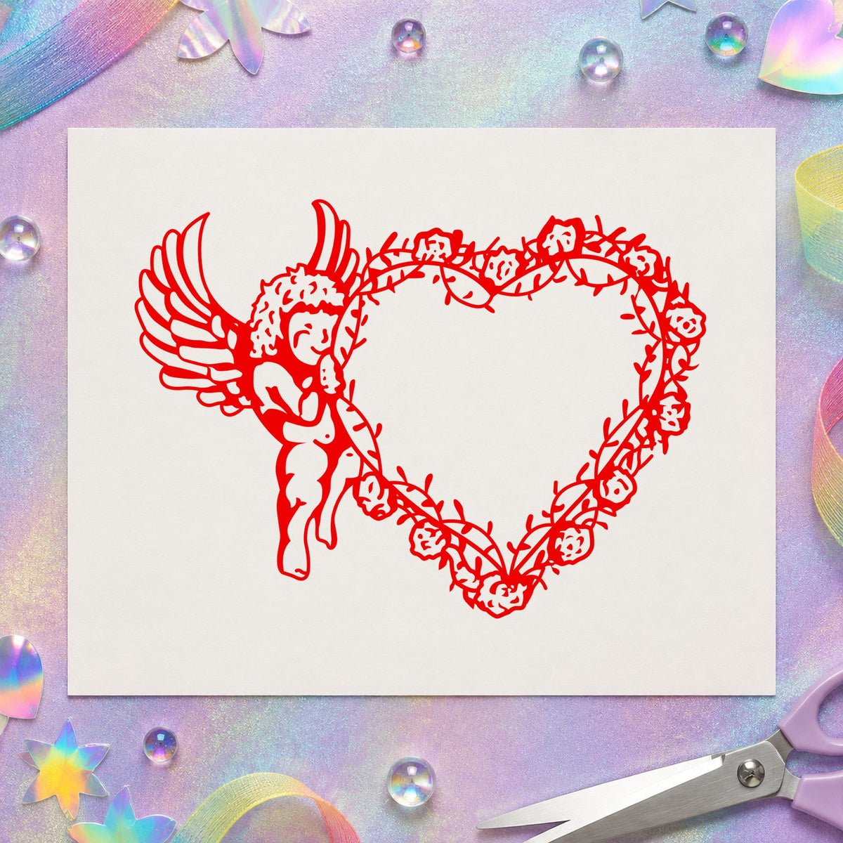 Cupid Holding Vine Heart Rubber Stamp impression in red ink on white paper in a styled craft setting.