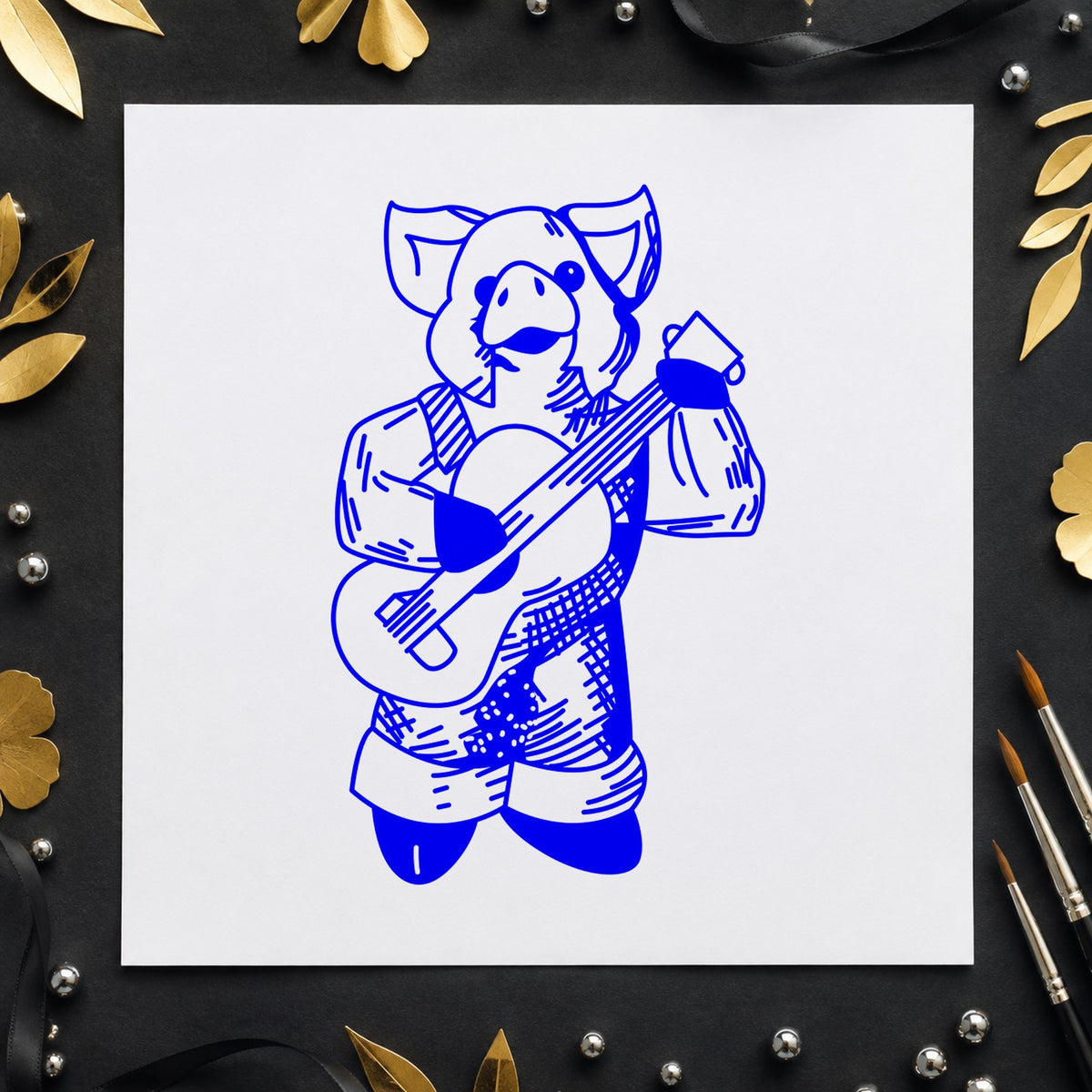 Blue funny pig stamp impression featuring the banjo playing pig design on white paper.
