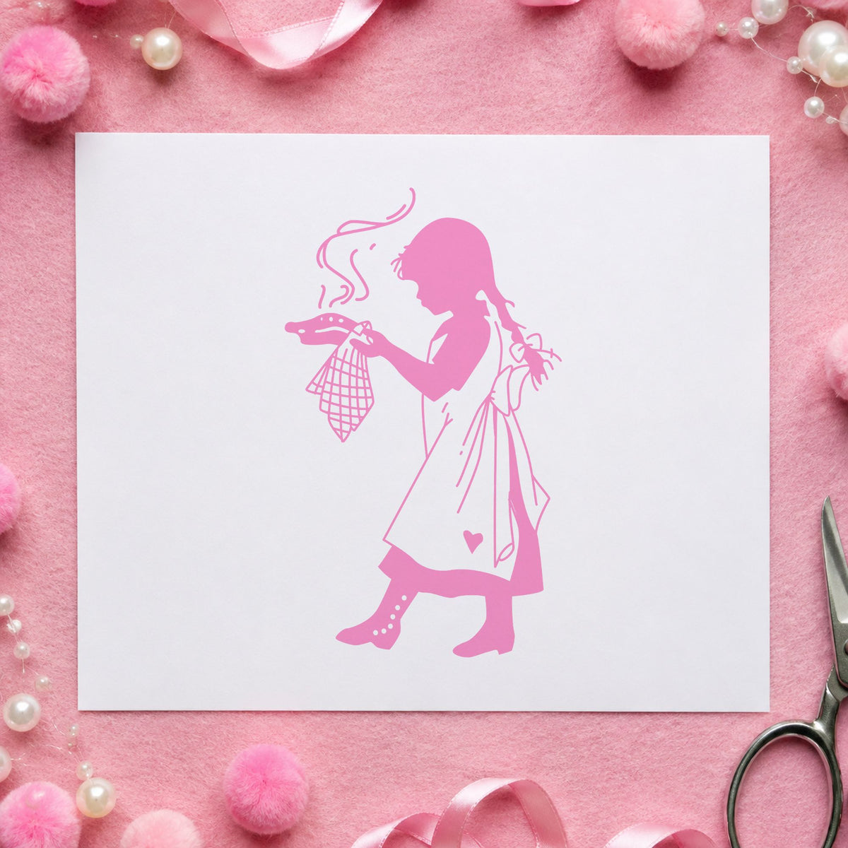 Girl Serving Pie Rubber Stamp impression in pink ink on white paper in a styled craft setting.
