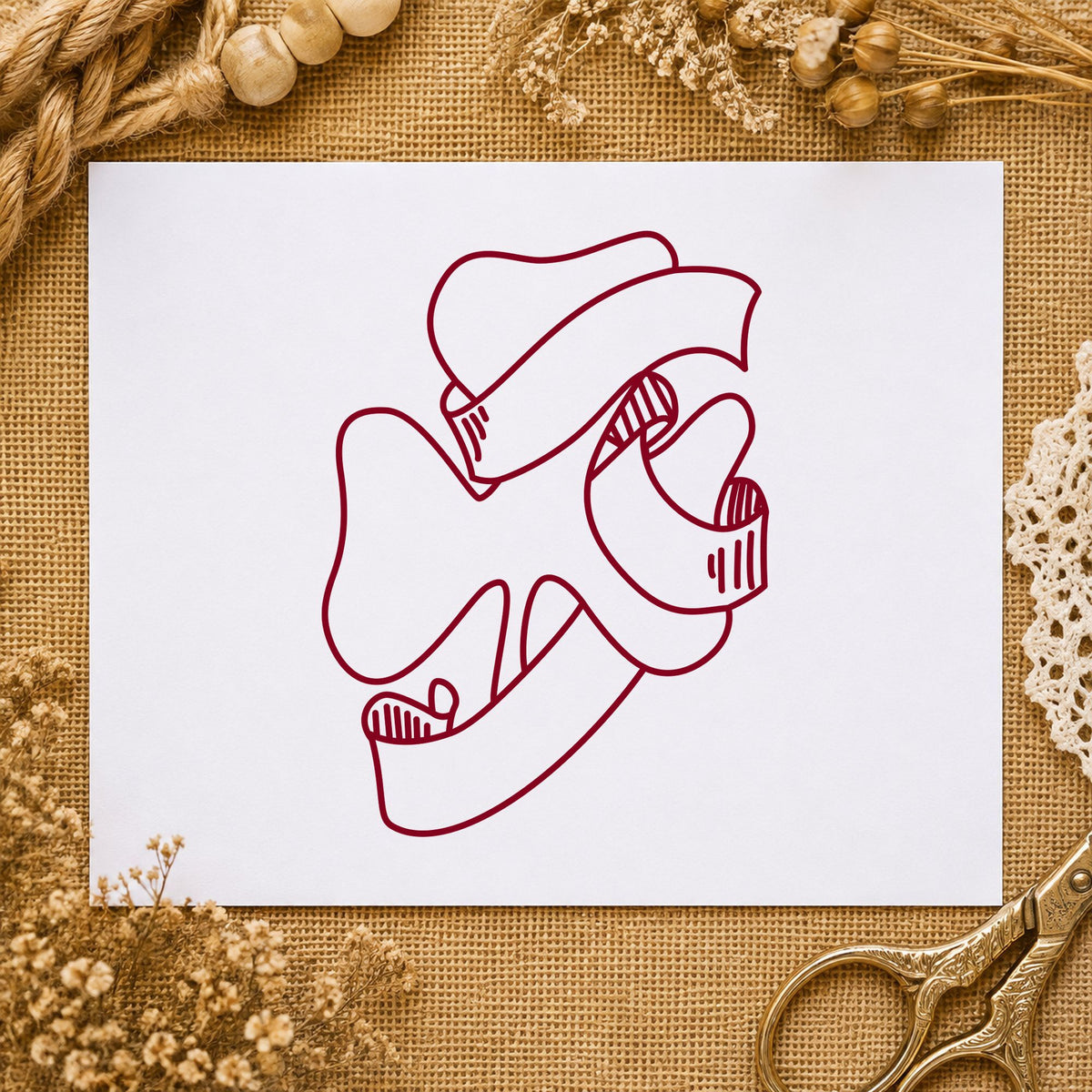 Shamrock with Leprechaun Hat Rubber Stamp impression in burgundy ink on white paper in a styled craft setting.