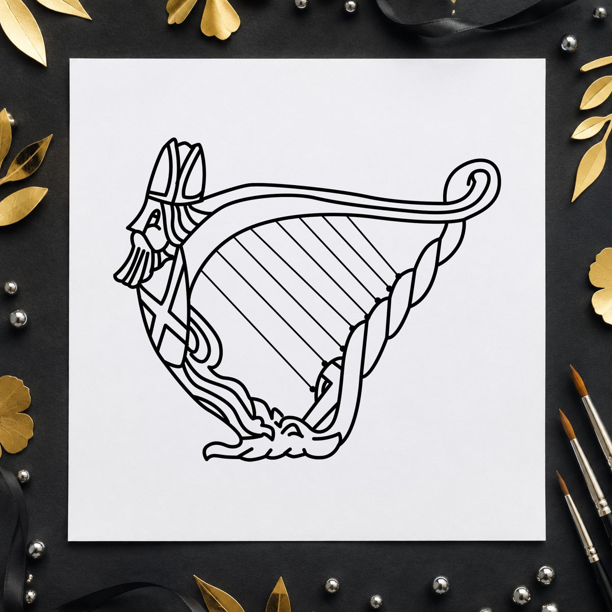 Black impression from a harp rubber stamp, featuring the decorative harp design on white paper.