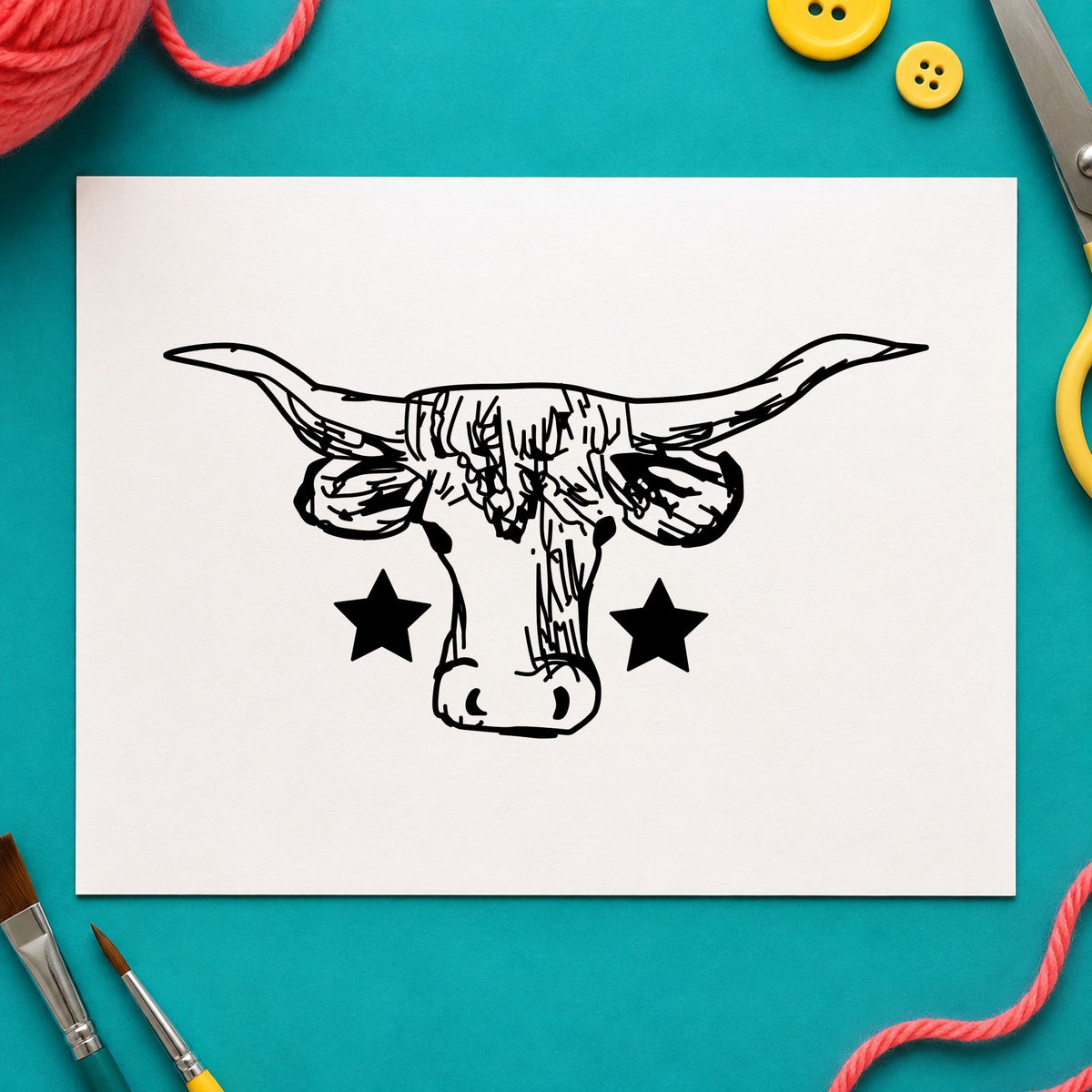 Black impression from a longhorn rubber stamp, featuring the lone star longhorn bull design on white paper.