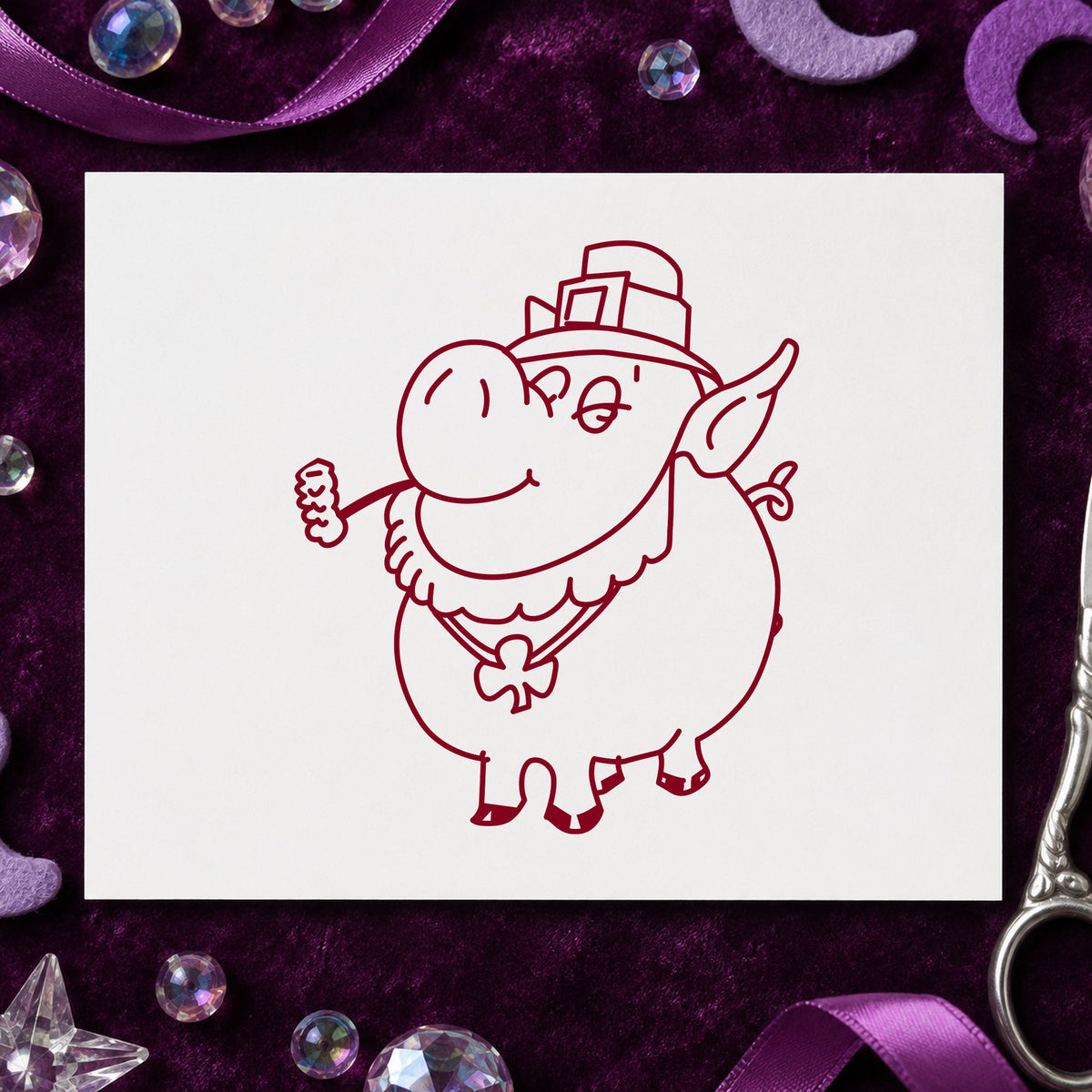 Irish Pig with Shamrock Rubber Stamp impression in burgundy ink on white paper in a styled craft setting.