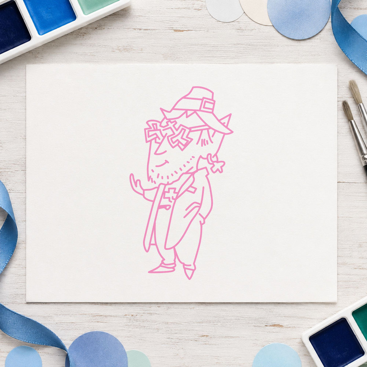 Leprechaun with Shamrock Glasses Rubber Stamp impression in pink ink on white paper in a styled craft setting.