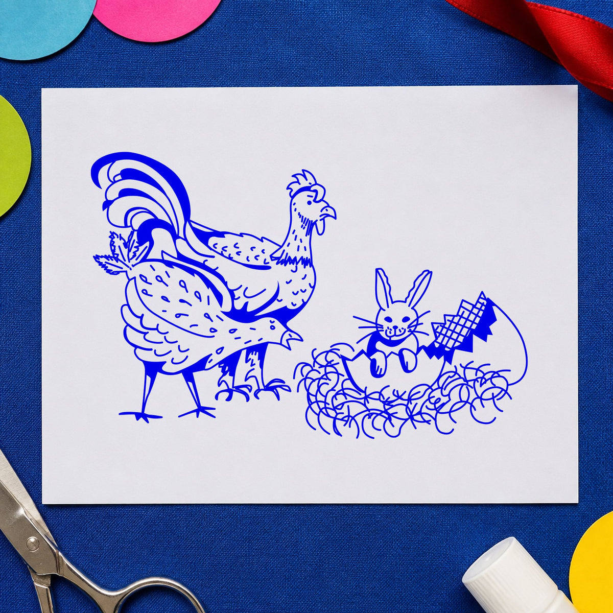 Blue chicken rubber stamp impression featuring the chickens and bunny in easter egg design on white paper.