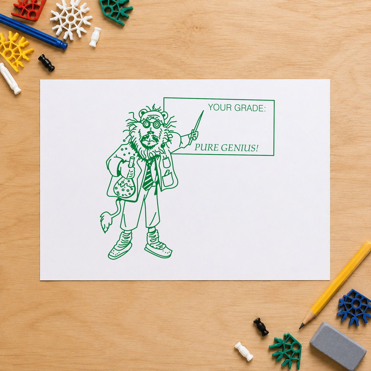 Your Grade Pure Genius Lion Rubber Stamp impression in green ink on white paper in a styled craft setting.
