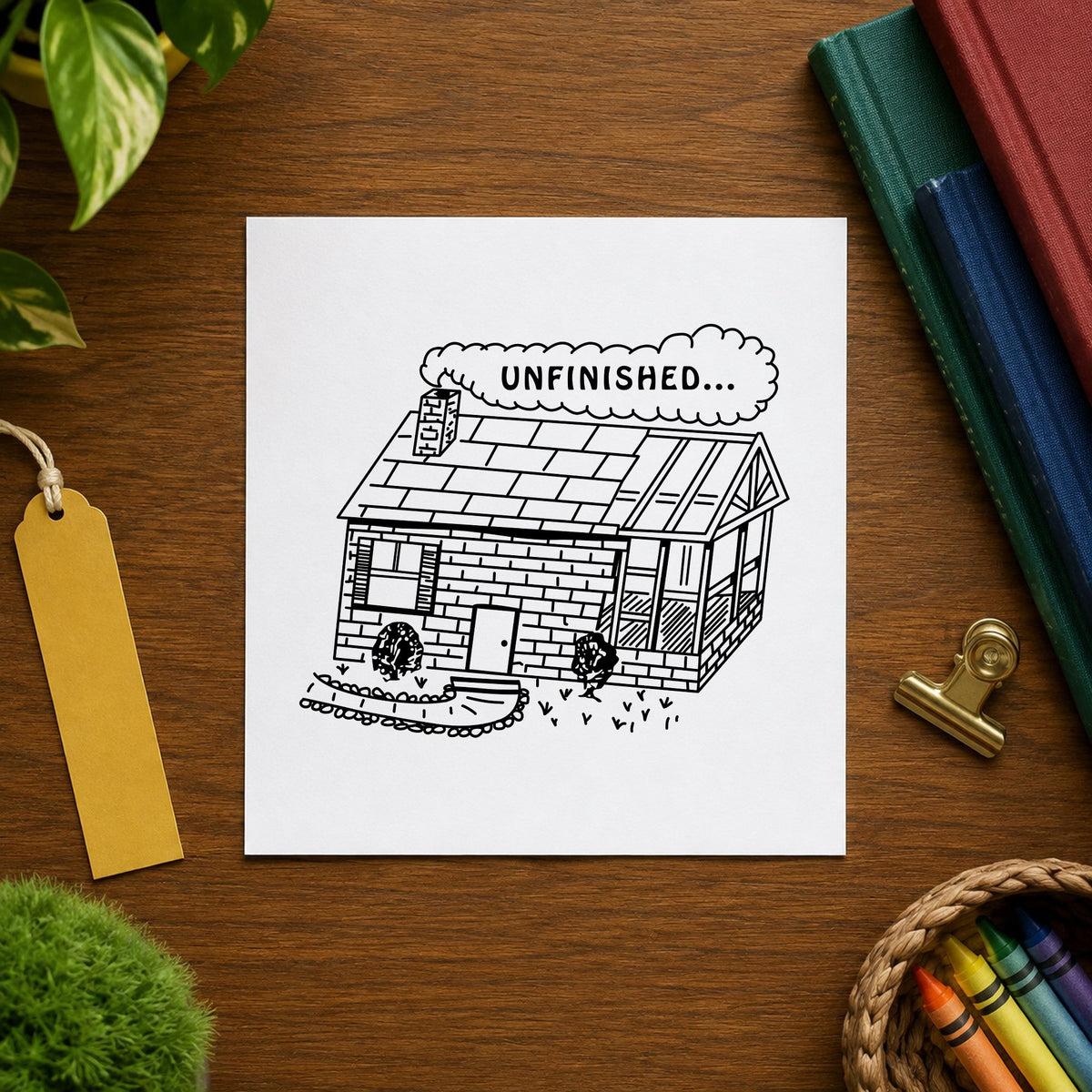 Unfinished Work Reminder Rubber Stamp impression in black ink on white paper in a styled craft setting.