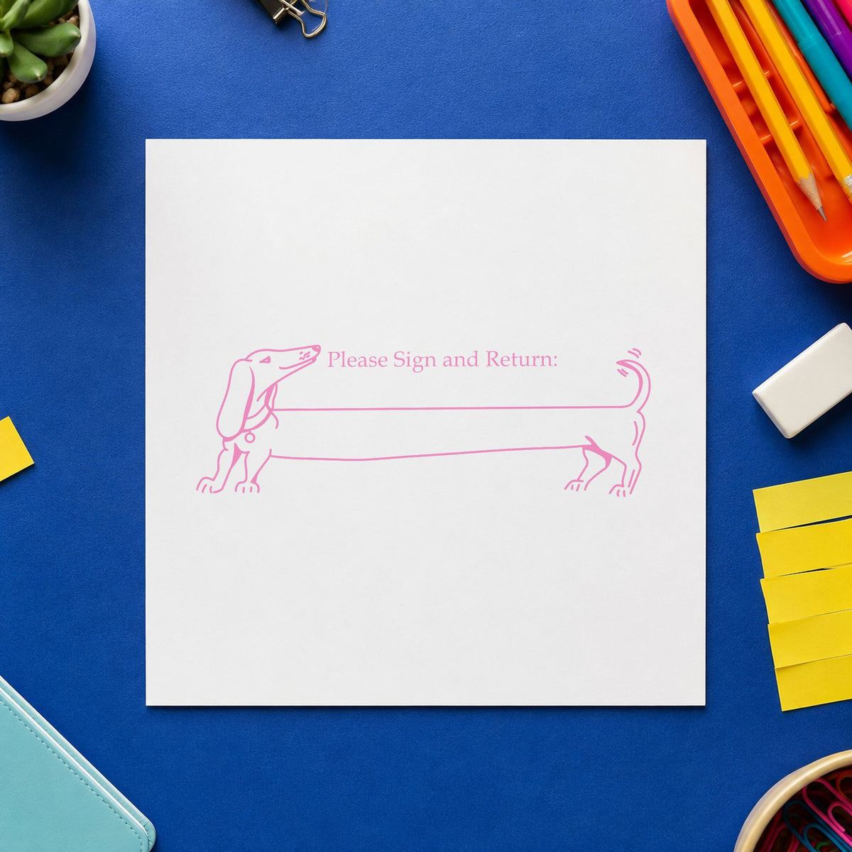 Blank Award Ribbon Rubber Stamp impression in pink ink on white paper in a styled craft setting.