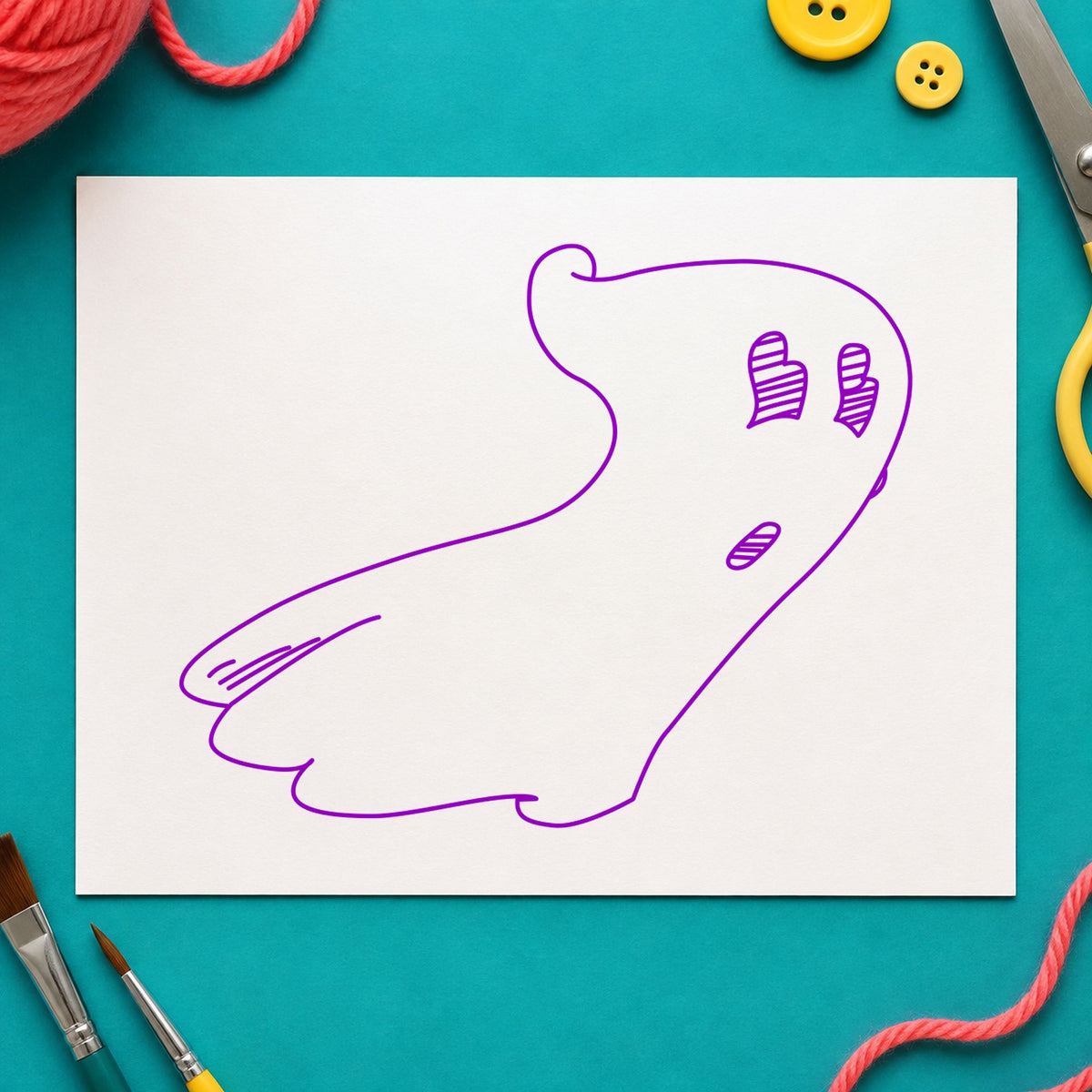 Spooky Ghost Rubber Stamp impression in purple ink on white paper in a styled craft setting.