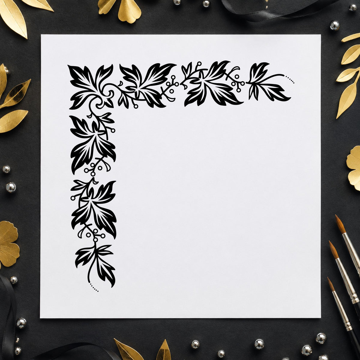 Black impression from a leaf border stamp, featuring the semi solid leaf corner design on white paper.