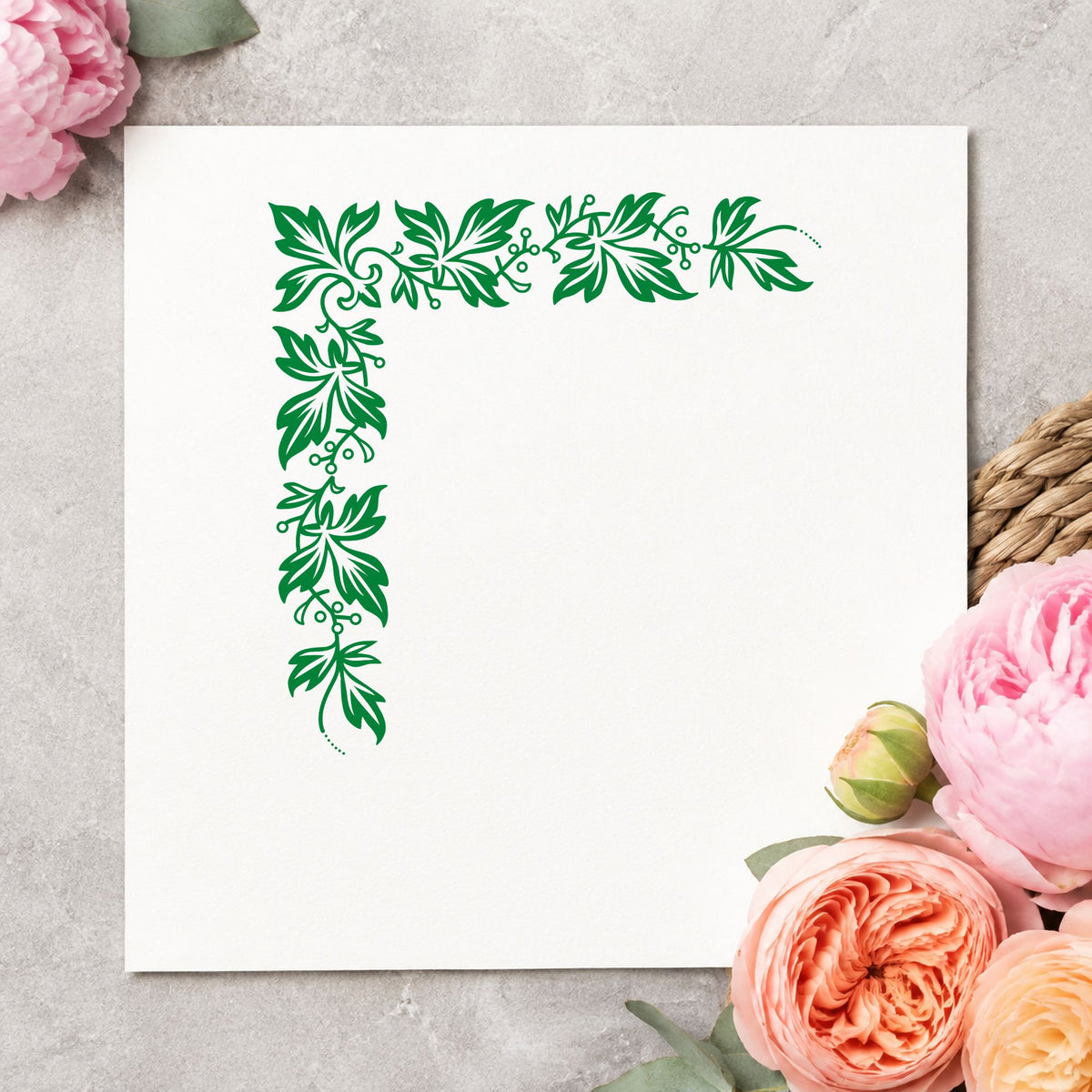 Semi Solid Leaf Corner Rubber Stamp impression in green ink on white paper in a styled craft setting.