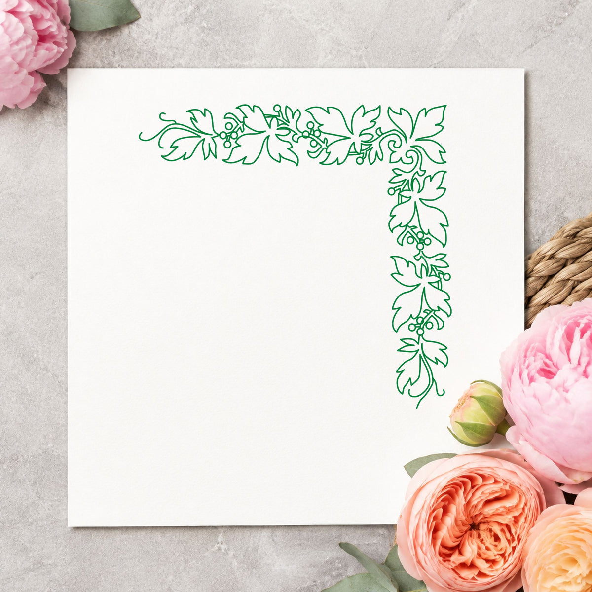 Open Leaf Corner Border Rubber Stamp impression in green ink on white paper in a styled craft setting.