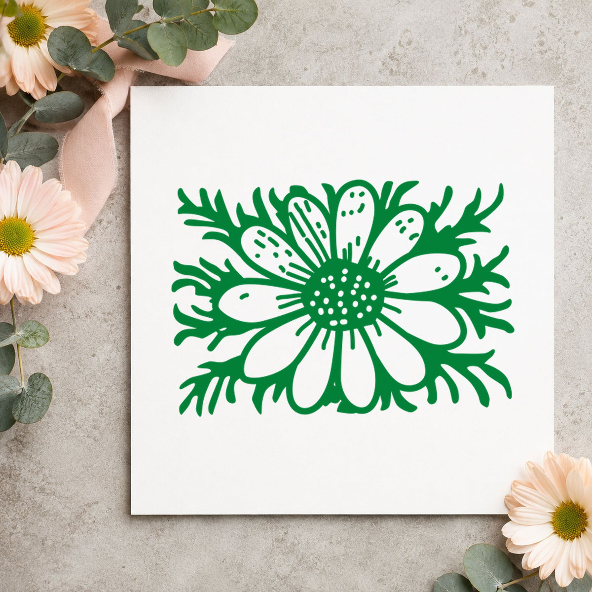 Daisy with Stem Rubber Stamp Small impression in green ink on white paper in a styled craft setting.