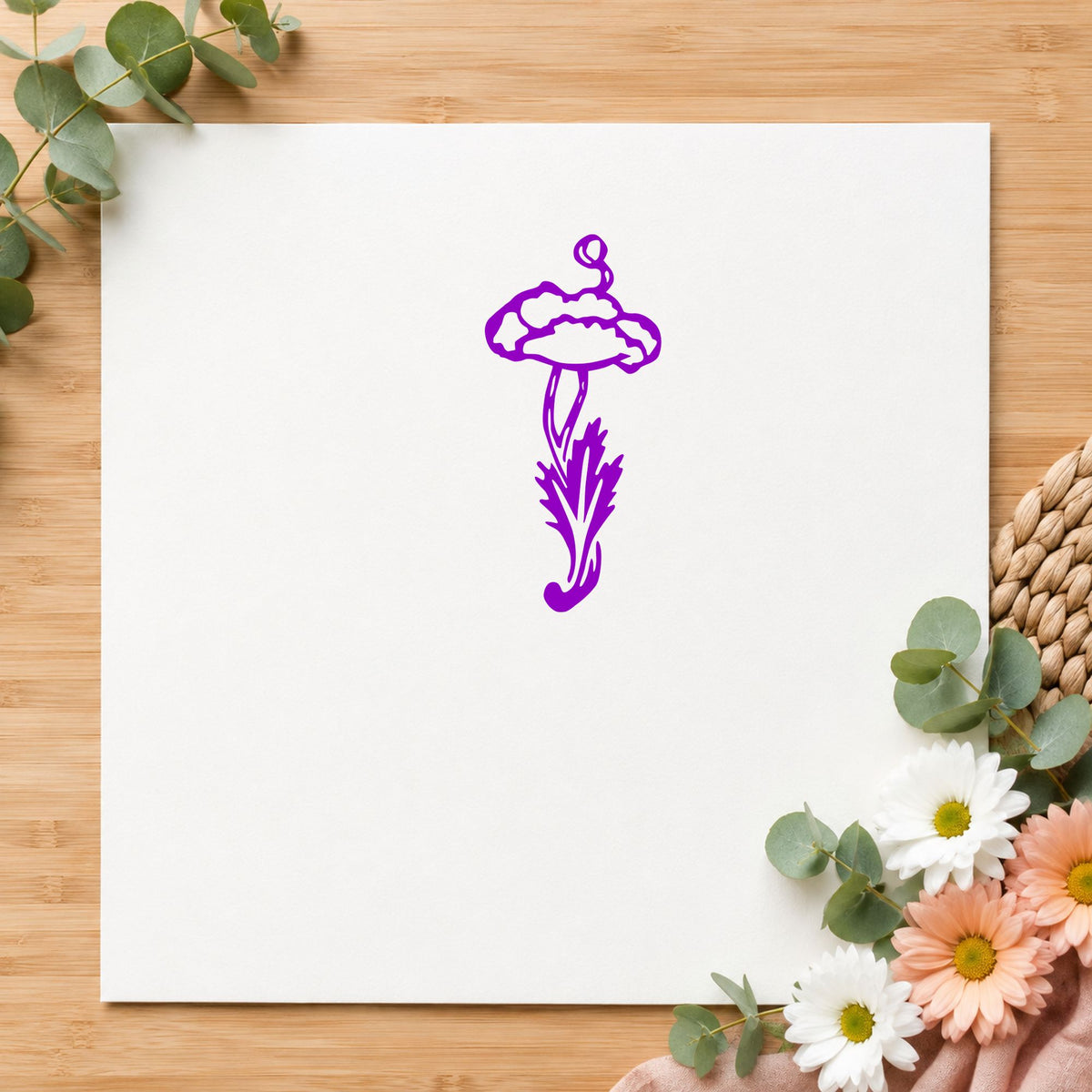 Single Flower with Stem Rubber Stamp impression in purple ink on white paper in a styled craft setting.