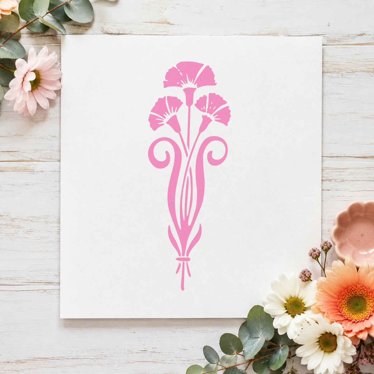 Three Flowers in a Vase Rubber Stamp impression in pink ink on white paper in a styled craft setting.