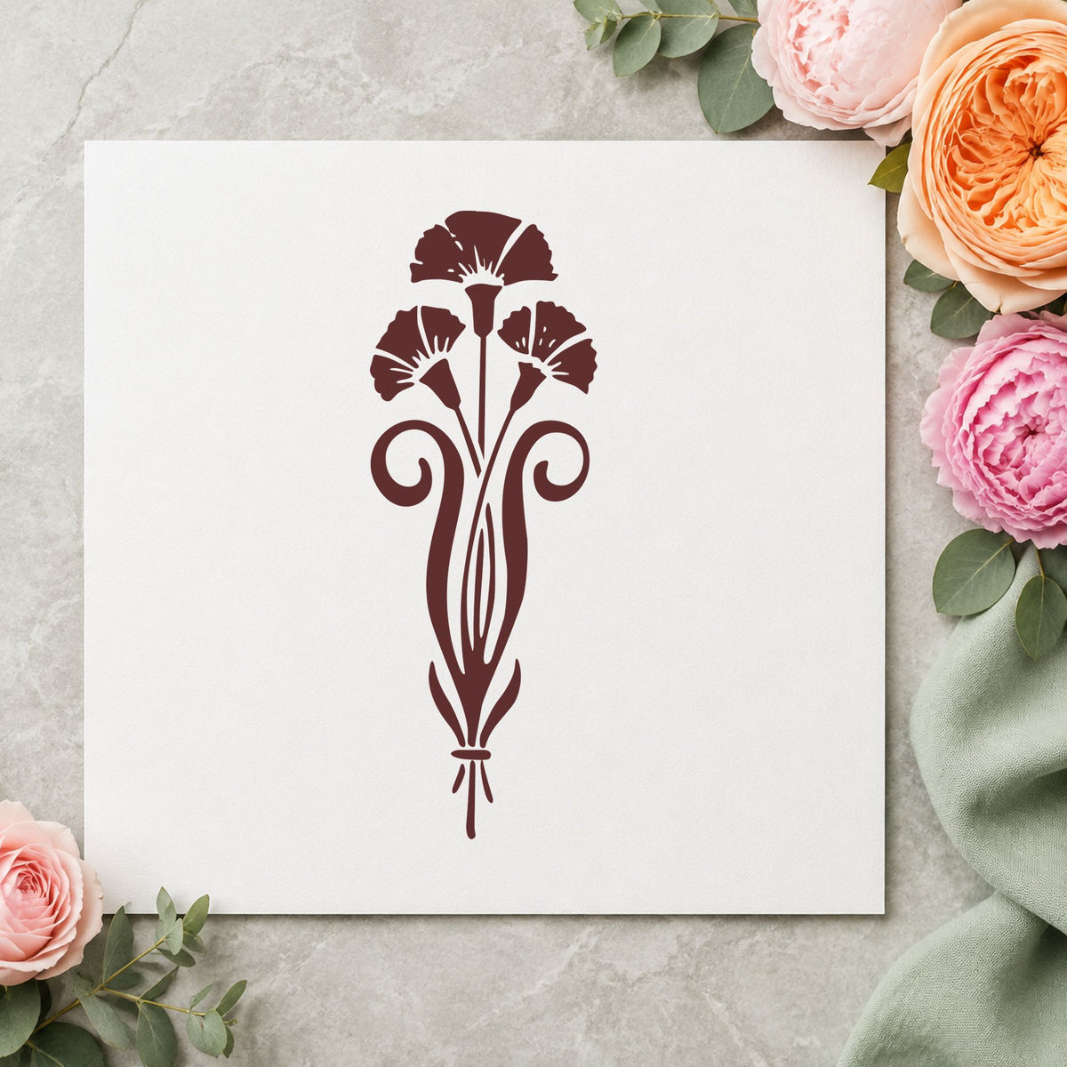 Three Flowers in a Vase Rubber Stamp impression in brown ink on white paper in a styled craft setting.