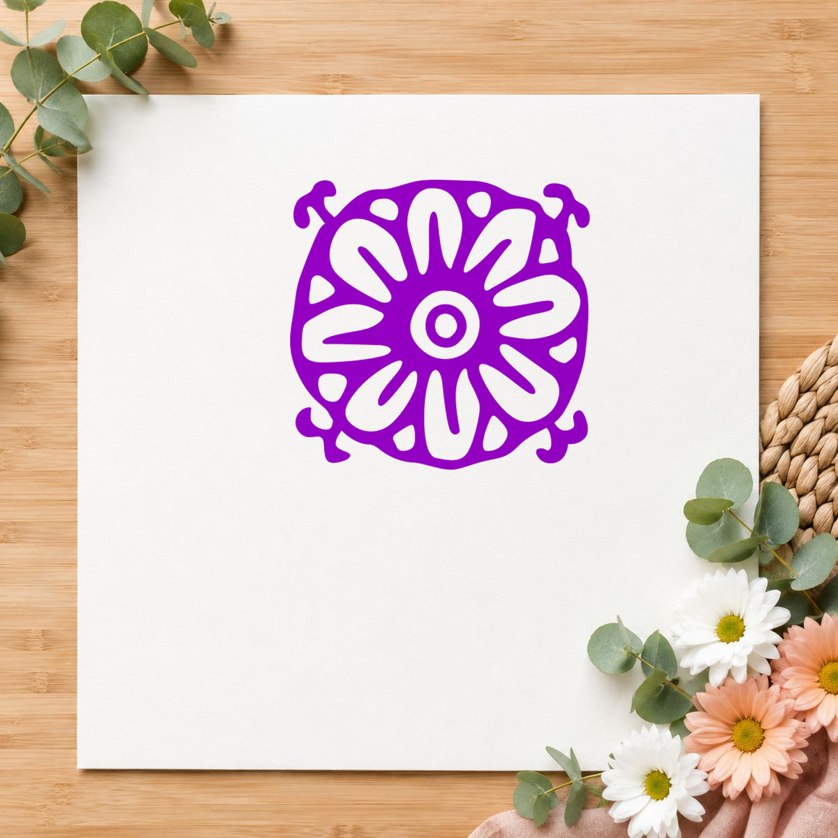 Square Flower Motif Rubber Stamp impression in purple ink on white paper in a styled craft setting.
