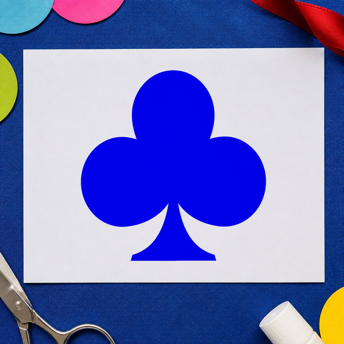 Playing Card Club Rubber Stamp impression in blue ink on white paper in a styled craft setting.