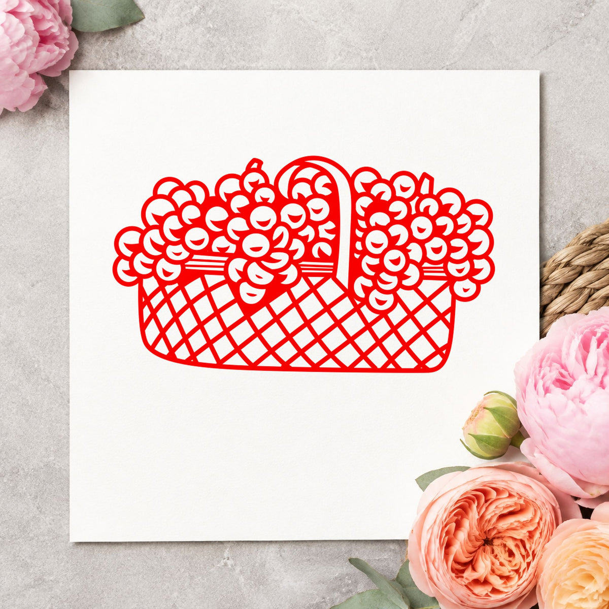 Basket of Flowers Rubber Stamp Large impression in red ink on white paper in a styled craft setting.