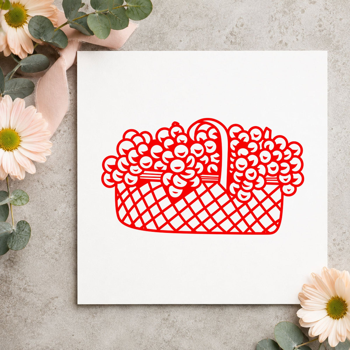 Basket of Flowers Rubber Stamp Small impression in red ink on white paper in a styled craft setting.