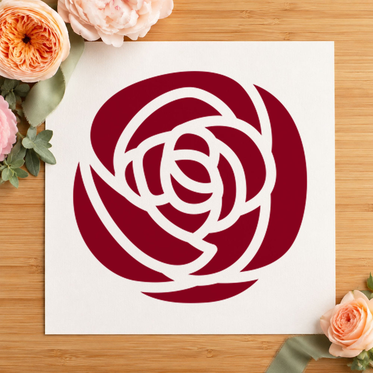 Single Solid Flower Rubber Stamp impression in burgundy ink on white paper in a styled craft setting.