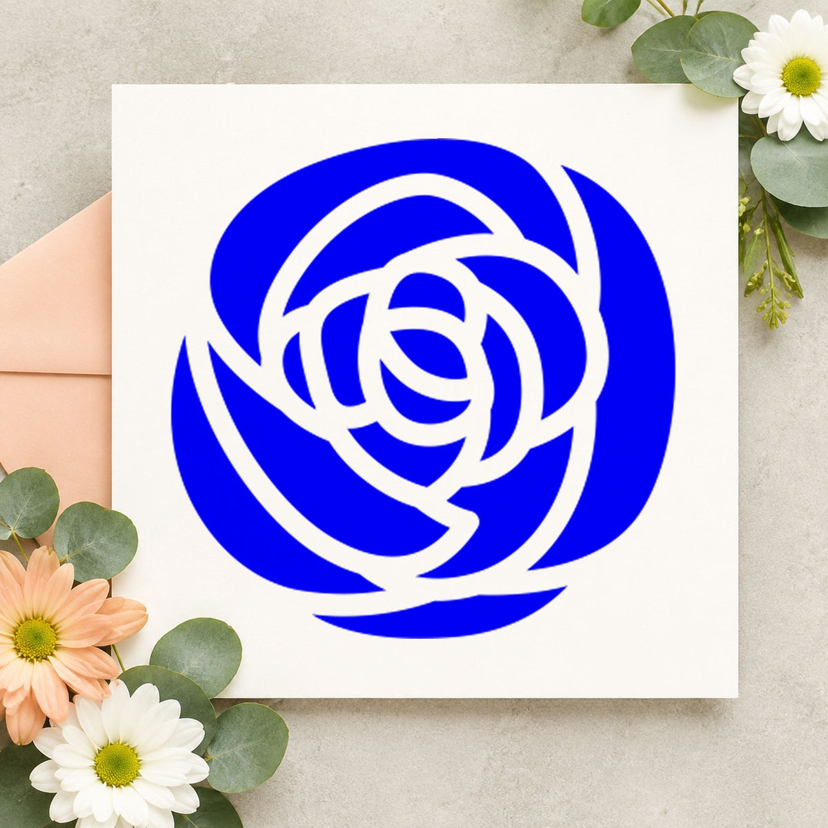 Single Solid Flower Rubber Stamp impression in blue ink on white paper in a styled craft setting.