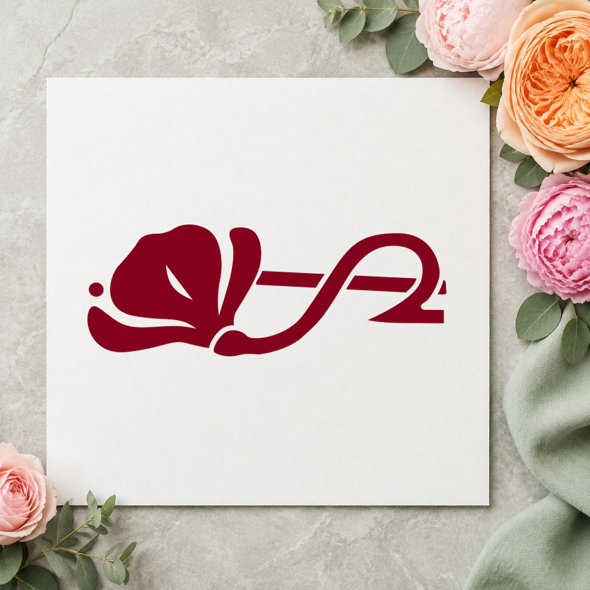 Left Flower Border Rubber Stamp impression in burgundy ink on white paper in a styled craft setting.