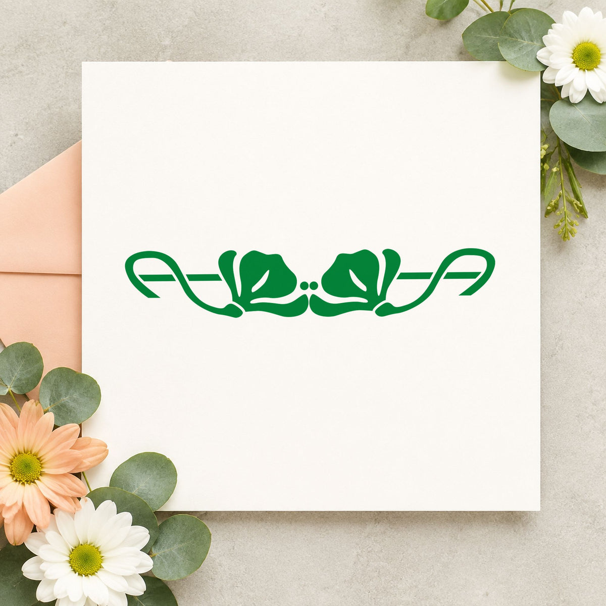 Double Flower Border Rubber Stamp impression in green ink on white paper in a styled craft setting.