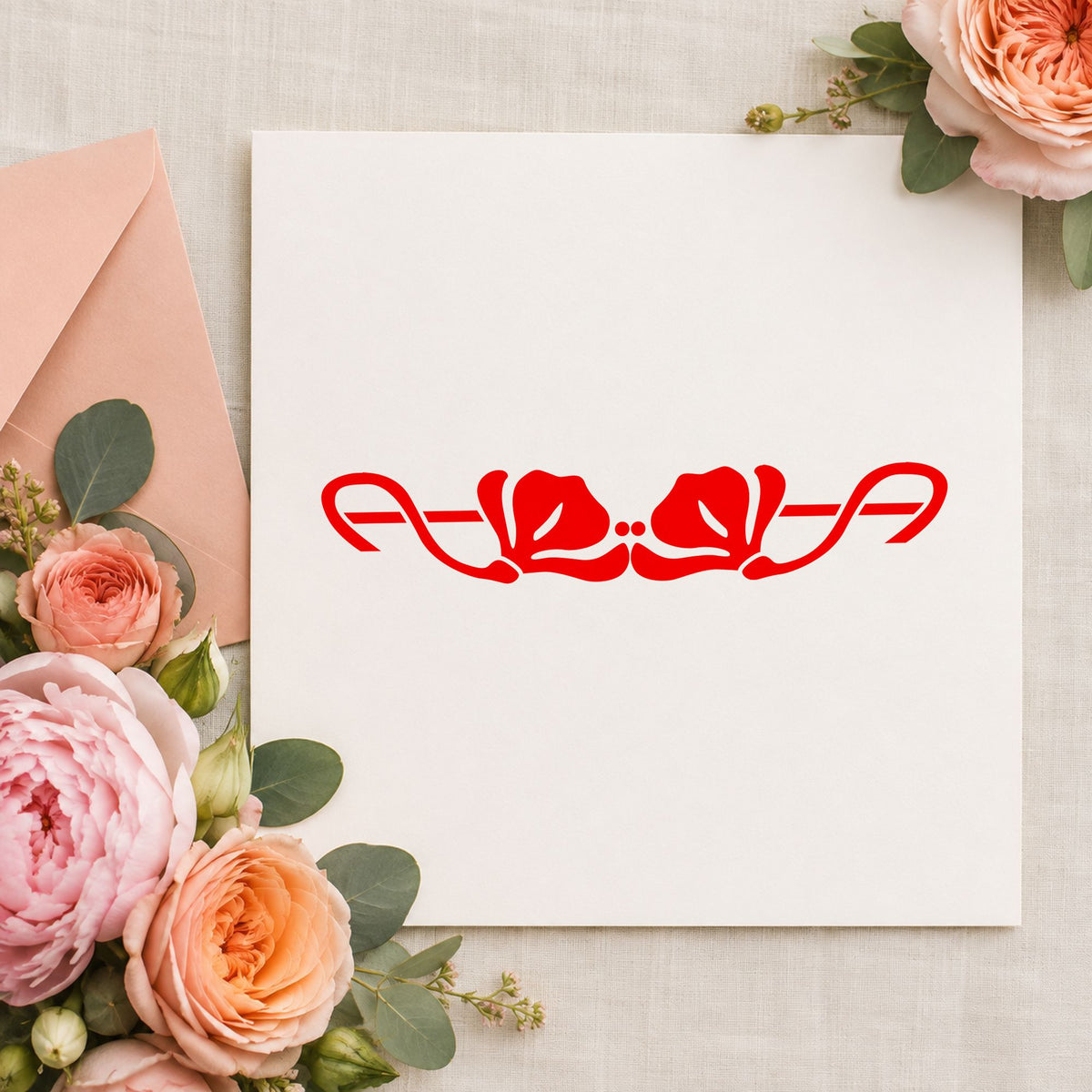 Double Flower Border Rubber Stamp impression in red ink on white paper in a styled craft setting.