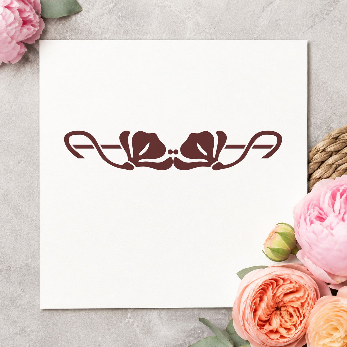 Double Flower Border Rubber Stamp impression in brown ink on white paper in a styled craft setting.