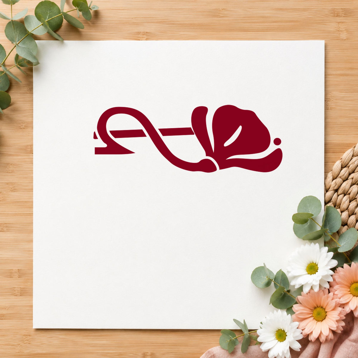 Right Single Flower Border Rubber Stamp impression in burgundy ink on white paper in a styled craft setting.